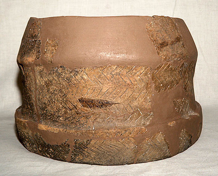 Part of a pot standing on its rim Part of a pot standing on its rim