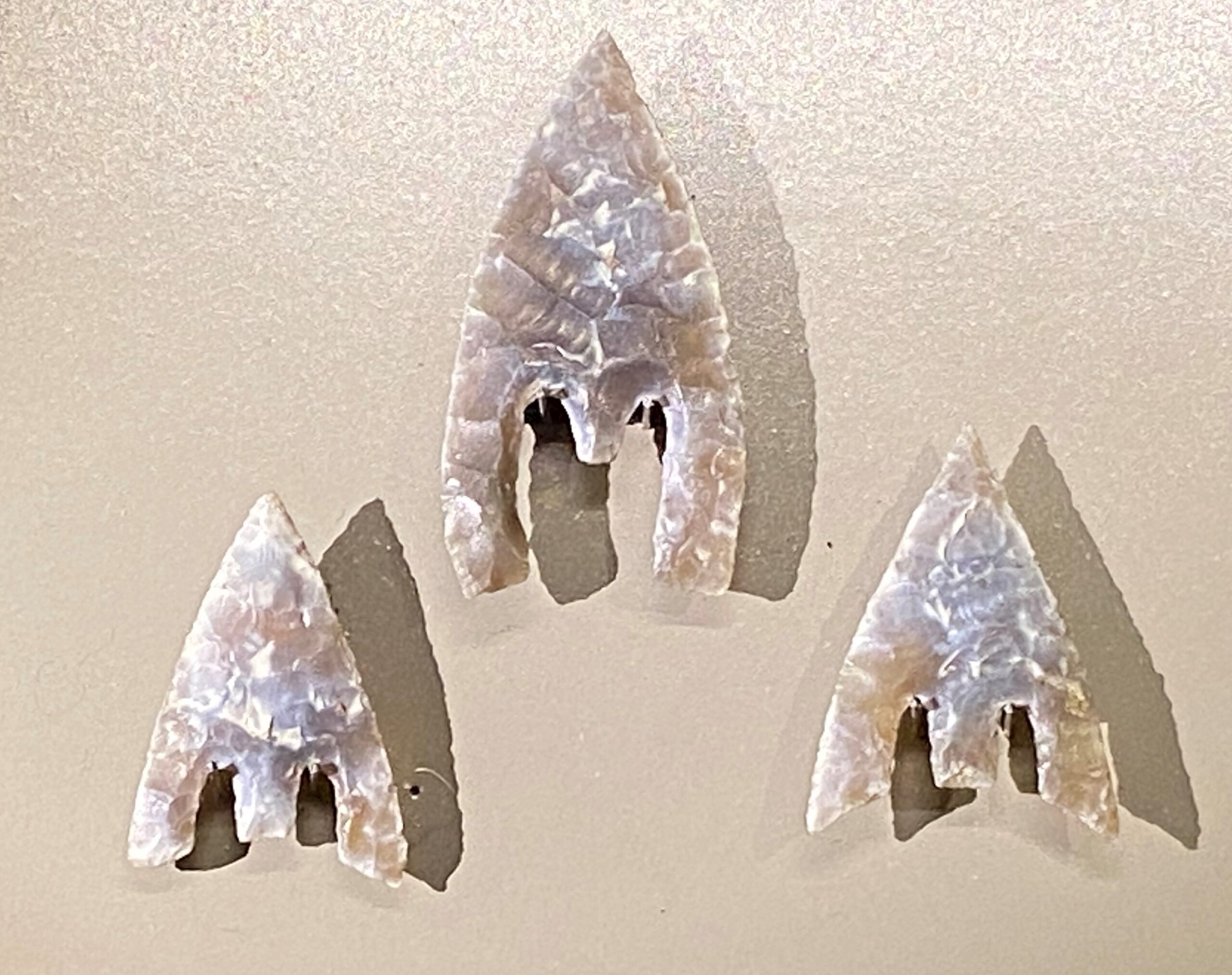 Three finely worked bronze age arrowheads at Wiltshire Museum