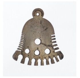 Bell shaped 2-D object with different sized holes and cut-outs