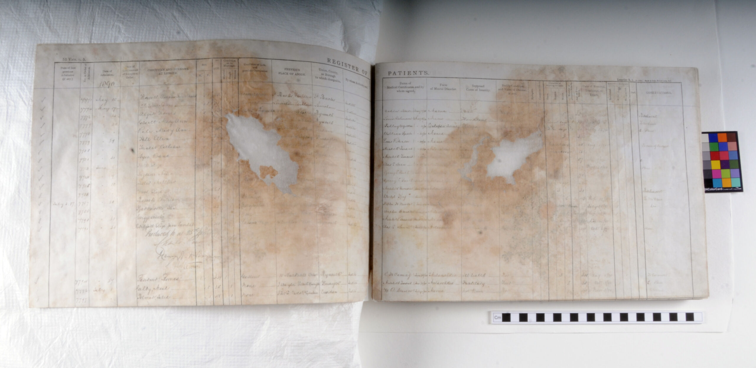 Double pages with manuscript text filled into printed grid. Pale brown discoloration and holes in pages filled and stabilised with transparent lining paper.